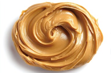 Swirl of smooth peanut butter spread on a white surface, showing creamy texture and natural light creating shadows around its edges