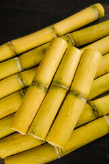 Fresh Cut Sugarcane Stalks with Yellow and Green Natural Skin Texture Details