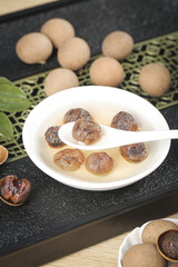 Traditional Guangdong Chinese Sweet Soup with Dried Longan and Glutinous Rice Balls Dessert