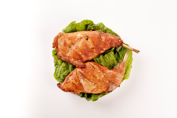 Szechuan Roasted Rabbit Legs Cold Dish Traditional Chinese Cuisine on Lettuce Leaves