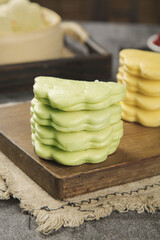 Traditional Handmade Hoecakes on Wooden Board - Green and Yellow Flatbread Stack