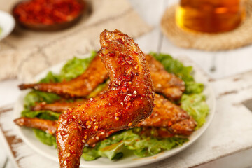 Freshly Roasted Szechuan Style Rabbit Legs Showcase - Traditional Chinese Spicy Dishes with Tea