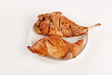 Szechuan Style Smoked Rabbit Legs Traditional Chinese Dish on White Plate