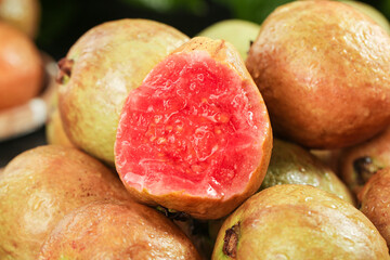 Fresh Guava Fruit Cut Half Pink Heart Flesh Guangxi Tropical Organic Healthy Food Wood Background