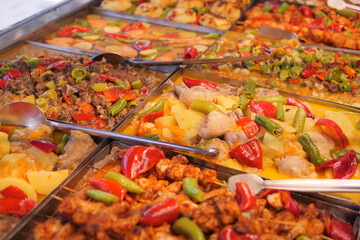 Delicious assortment of grilled dishes at a buffet setting