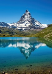 Naklejka premium Mountain peak reflecting in lake