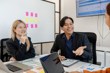 group of businessman are brainstorming about their business project, these entrepreneurs are meeting about finance, accounting and marketing in the office, presentation, discussing
