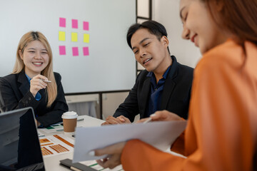 one of marketing team is explaining the presentation to the team, group of businessman are meeting in the office, these entrepreneur are brainstorming about their business project, finance, accounting