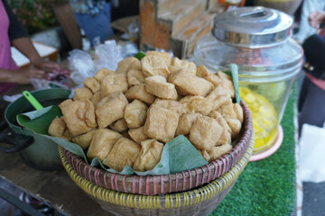Basket of Fried Tofu on Street Vendor Table