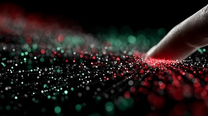 Fingertip Exploring Red and Green Illuminated Particles