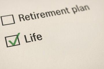Life insurance retirement planning future financial. Checklist showing "Life" selected and "Retirement plan" unselected, symbolizing life choices.