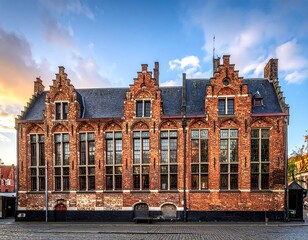 Historic brick building facade at dawn