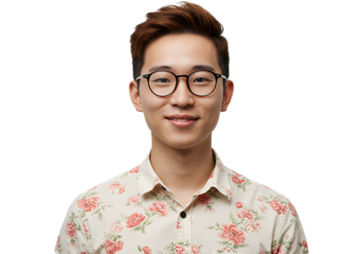 Young Asian man wearing glasses and a floral shirt, smiling confidently in a studio portrait