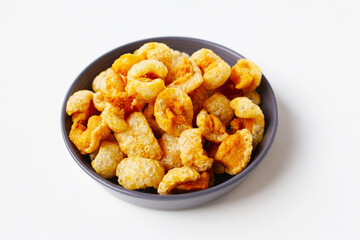 Crispy pork cracklings, a crunchy savory snack.