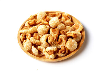 Crispy pork cracklings, a crunchy savory snack.