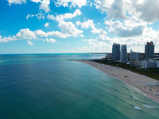 Miami city landscape on blue sky with clouds. South beach coastal in Miami. Skyscrapers in Miami,...