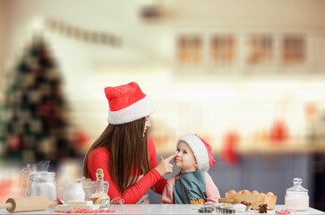 happy Mother and daughter preparing tasty Christmas  food