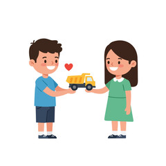 A boy in a blue t-shirt handing a yellow toy truck to a girl in a green dress, both are smiling.