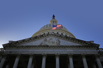 Washington DC. Capitol dome. Congress and Senate Capitol building in Washington D.C.. USA flag over Capitol dome. American Capitol. Congress and Senate in Washington D.C.