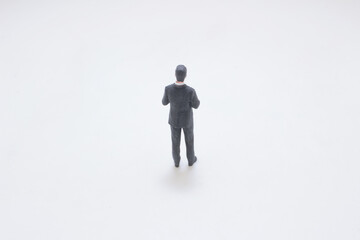 Miniature Businessman Figurine Standing in Black Suit