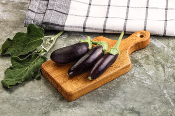 Small few baby eggplant over board