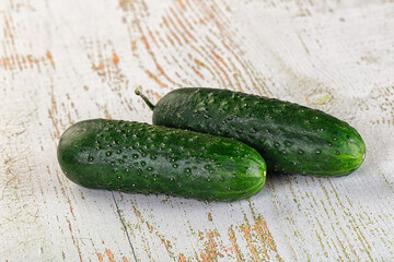 Ripe green raw two cucumbers