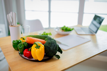 A joyful child and woman indoors holding glasses of milk, smiling happily, symbolizing health, freshness, nourishment, and a positive lifestyle.

