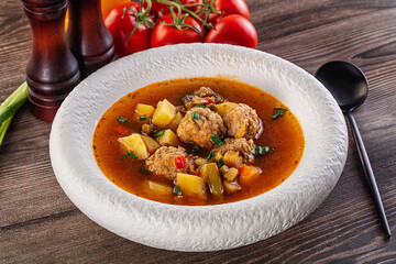 Tomato Soup with meatballs and vegetables