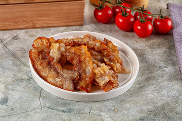 Fried crispy pork bacon snack