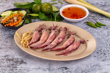 Boiled wild mini calamari snack