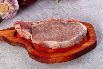 Raw pork steak with bone
