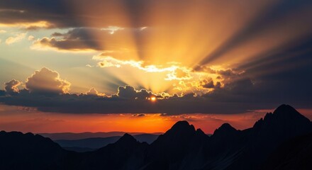 Fototapeta premium Dramatic Sunset Sky Over Mountain Peaks Silhouettes