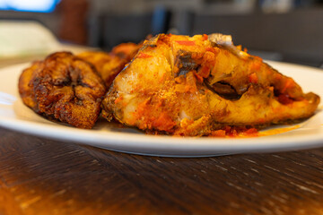 Grilled fish with Tomato Pepper stew and Plantain