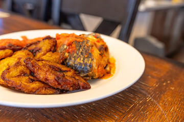 Grilled fish with Tomato Pepper stew and Plantain