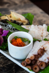 marinated fish roe and octopus slices with other seafood