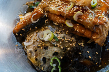 salmon braised with soy sauce and vegetable