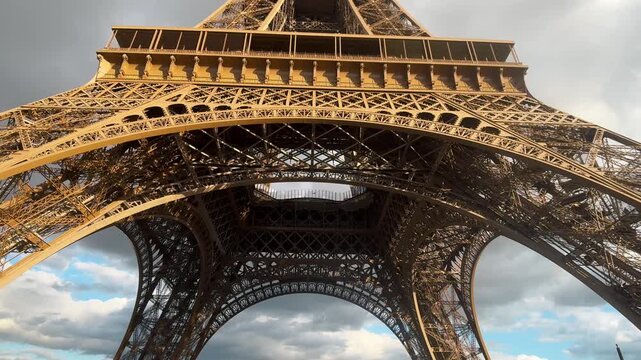 looking to the top of the Eiffel tower ,  Paris , France
