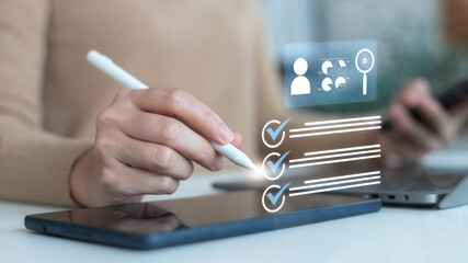 Hand using a digital checklist on a tablet with AI data analytics for recruitment, HR technology, employee search, human resource management, and productivity tools in the modern workplace.