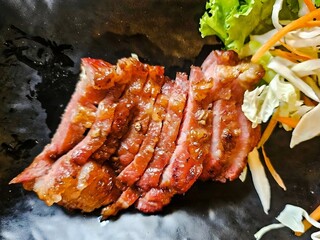 Tender and Juicy Thai BBQ Pork on a Plate