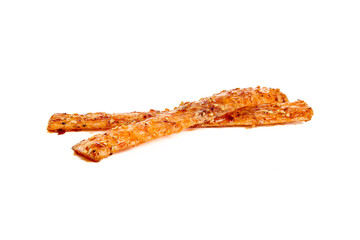 Handmade Spicy Twisted Breadsticks with Sesame Seeds on White Background