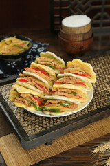 Traditional Handmade Lotus Leaf Buns Gourmet Asian Sandwich Cake on Bamboo Mat