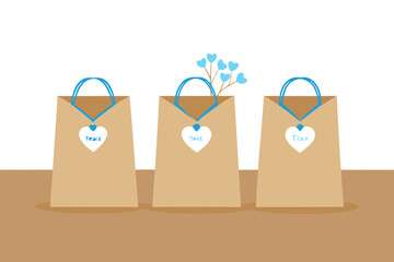 these are three brown paper gift bags lined up on 
