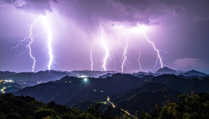 Dramatic lightning storm over mountainous landscape