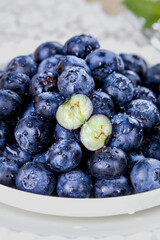 Fresh Blueberries with Water Droplets in Bowl - Healthy Organic Fruit