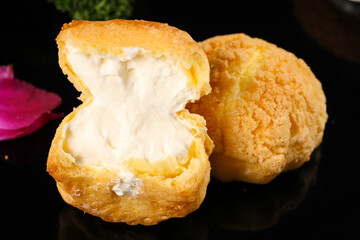 Golden Cream Puff Pastry Dessert with White Filling - Fresh Choux Pastry Sweet Treat