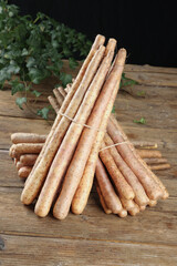 Fresh Chinese Yam Root Vegetables Bundle on Wooden Table - Traditional Asian Farming Produce
