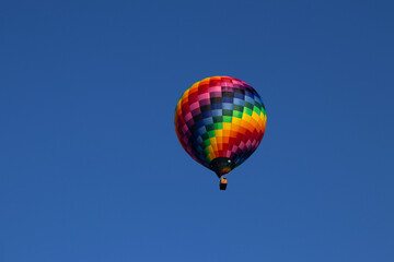 Colorful Hot Air Balloon Against a Clear Blue Sky