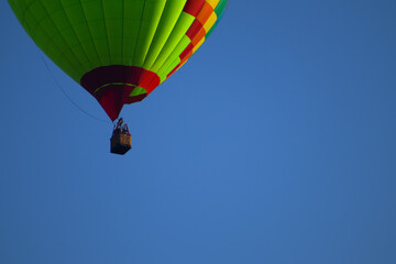 Colorful Hot Air Balloon Against a Clear Blue Sky