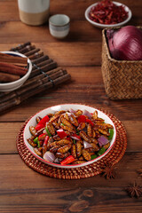 Spicy Silkworm Chrysalis Stir-Fry - Traditional Shandong Chinese Cuisine with Golden Fried Insects and Vegetables