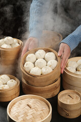 Fresh Steamed Bao Dumplings in Traditional Bamboo Steamers - Chinese Cuisine